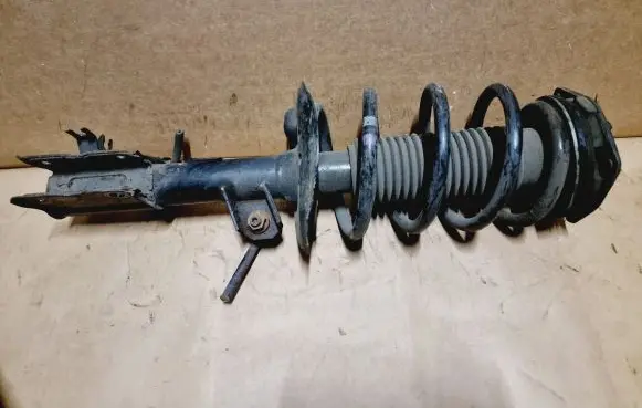Front shock absorber with coil spring