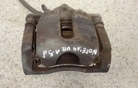 Nissan Note (E12) Front brake caliper