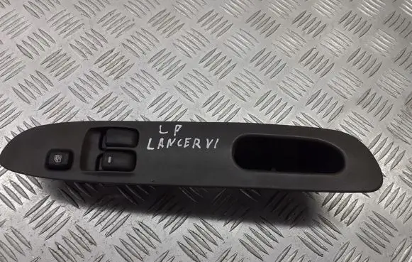 Mitsubishi Lancer Front door window switch trim MR194815