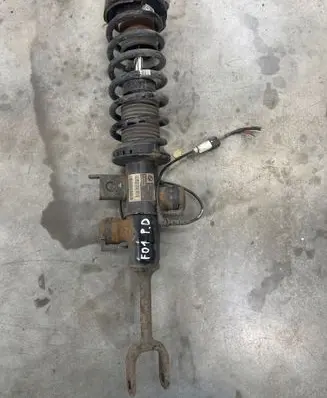 Front shock absorber with coil spring