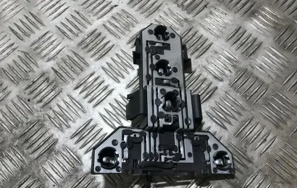 Tail light bulb cover holder