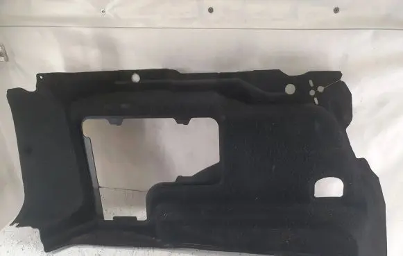 Trunk/boot lower side trim panel