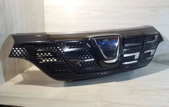 Dacia Spring Front bumper upper radiator grill 623105273R