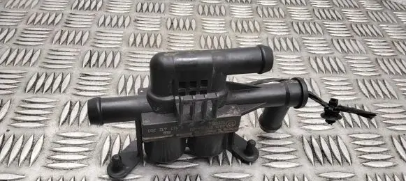 Coolant heater control valve