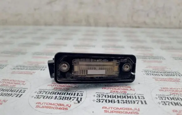 Volkswagen PASSAT B6 Number plate light 1J6943021B