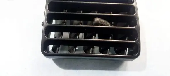 Mazda 323 Dash center air vent grill