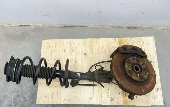 Nissan X-Trail T31 Front shock absorber with coil spring
