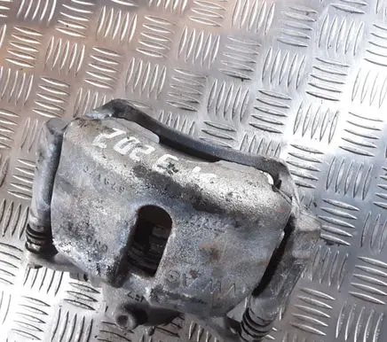 Volkswagen Golf VII Front brake caliper