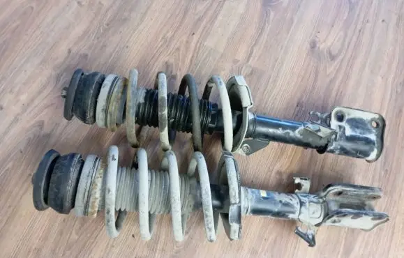 Front shock absorber with coil spring
