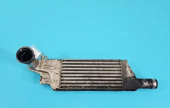 Opel Combo C Intercooler radiator 24466787 IMPRK1442573