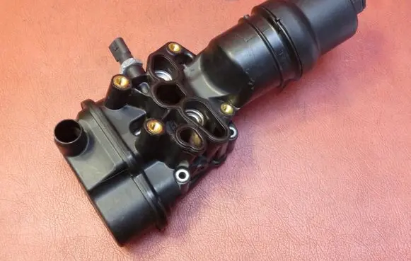 Seat Leon (1P) Oil filter mounting bracket 06F115397F