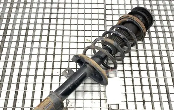 Suzuki Swift I Front shock absorber/damper
