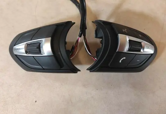 Steering wheel buttons/switches