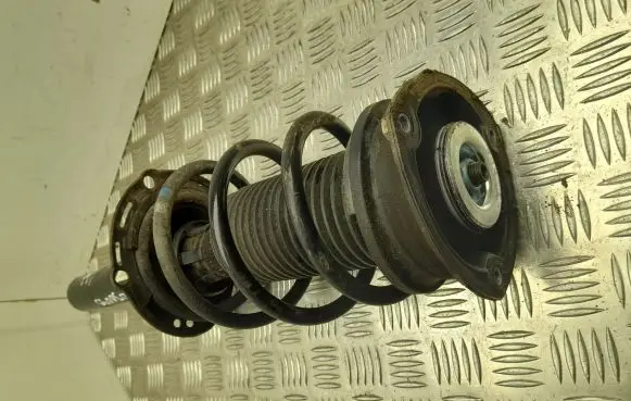 Volkswagen Golf VII Front shock absorber with coil spring 5Q0413023FK