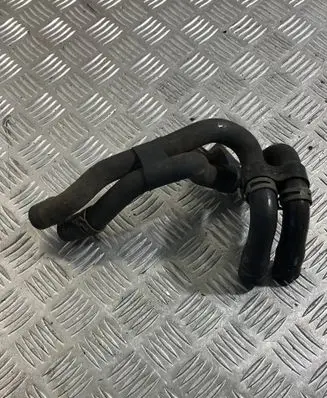 Volkswagen Touareg II Engine coolant pipe/hose 7P6122073A