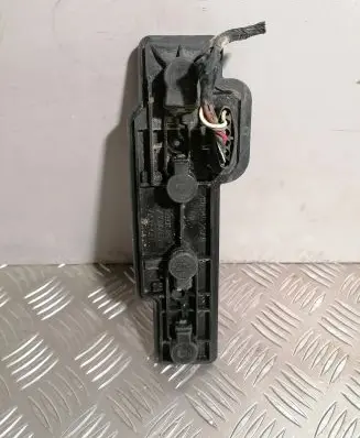 Tail light bulb cover holder