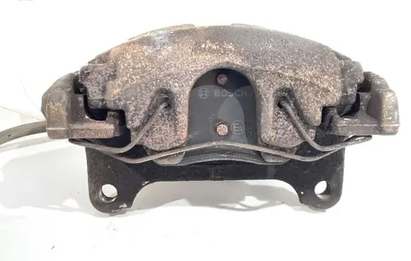 Volkswagen PASSAT B7 Front brake caliper 