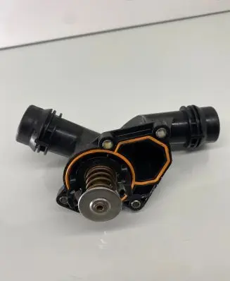 Thermostat/thermostat housing