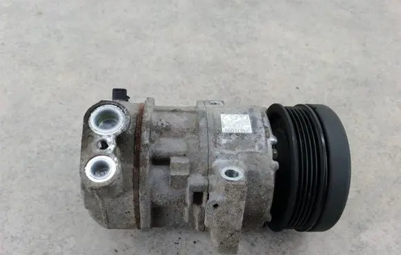 Opel Corsa D Air conditioning (A/C) compressor (pump) 557012005E5275200