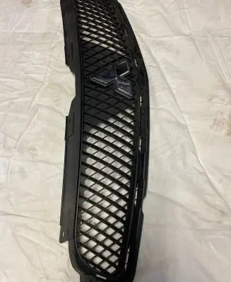 Mitsubishi Eclipse Front bumper upper radiator grill 7450A474 6508 7450A450