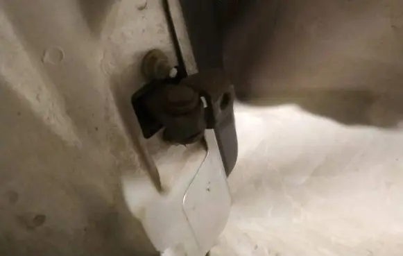 Rear door check strap stopper