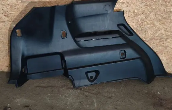 Trunk/boot lower side trim panel