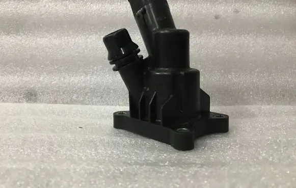 Thermostat/thermostat housing