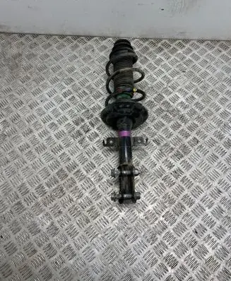 Front shock absorber with coil spring