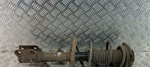 Nissan Juke I F15 Front shock absorber with coil spring 