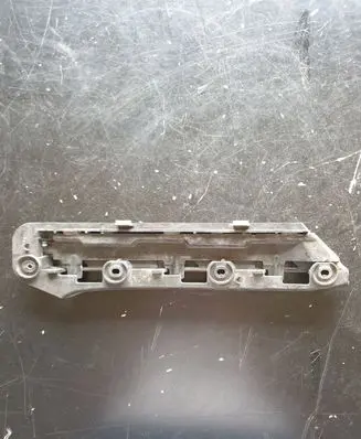 Volkswagen Touran I Front bumper mounting bracket 1T0807935
