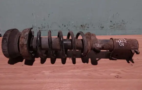 Front shock absorber with coil spring