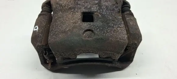 Nissan Juke I F15 Front brake caliper 