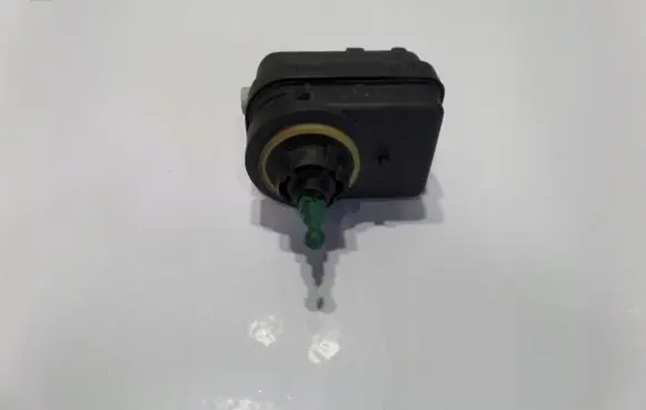 Renault Scenic I Headlight level adjustment motor 7700424223