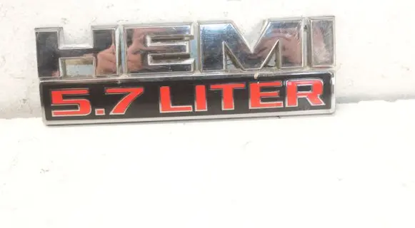 Dodge RAM 1500 DS Fender model badge letters 68149700AA
