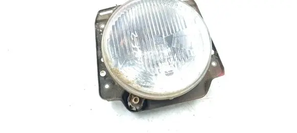Volkswagen Golf II Headlight/headlamp 111941605A