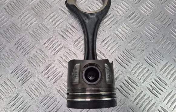 Piston with connecting rod