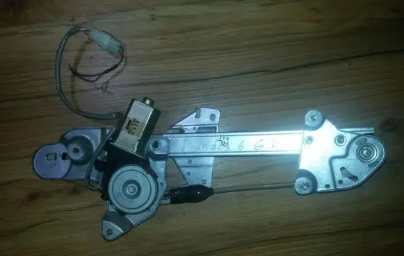 Sliding door window regulator with motor