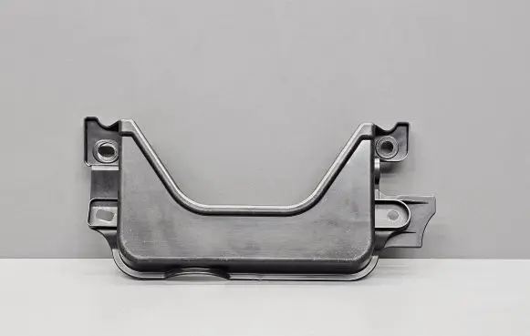Engine bonnet/hood lock trim molding