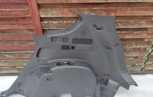 Trunk/boot lower side trim panel