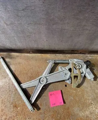Toyota Yaris Front door window regulator with motor 8572052020 0621009992