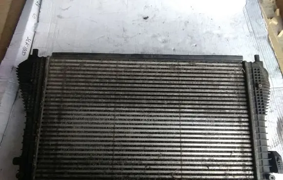 Volkswagen Golf V Intercooler radiator 1K0145803M
