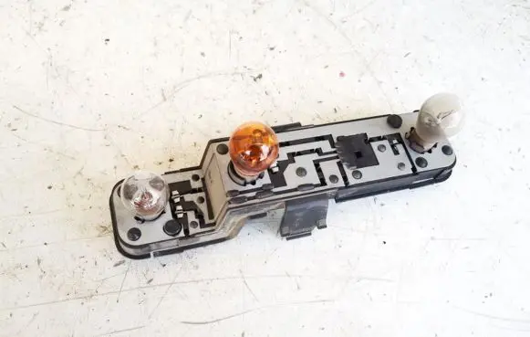 Nissan Almera N16 Tail light bulb cover holder 236873