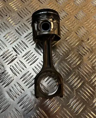 Piston with connecting rod