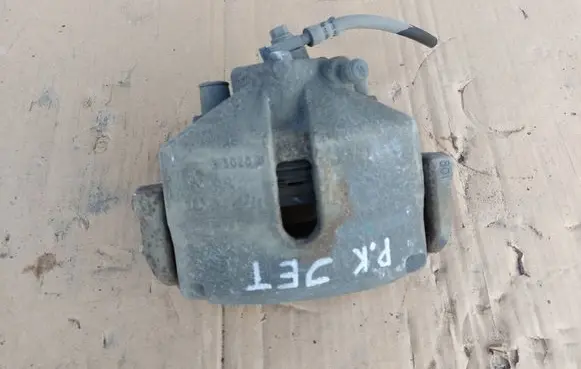 Volkswagen Jetta VI Front brake caliper