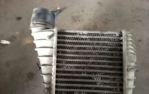 Volkswagen Golf IV Intercooler radiator 1J0145805D