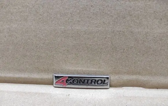Renault Laguna III Front door emblem/model letters 990882613R