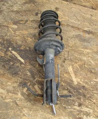 Toyota Yaris Front shock absorber with coil spring