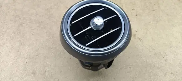 Dash center air vent grill