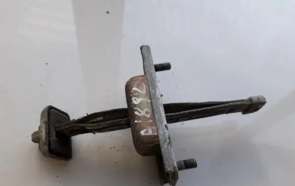 Mazda 626 Front door check strap stopper 