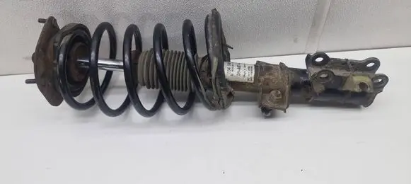 Front shock absorber with coil spring